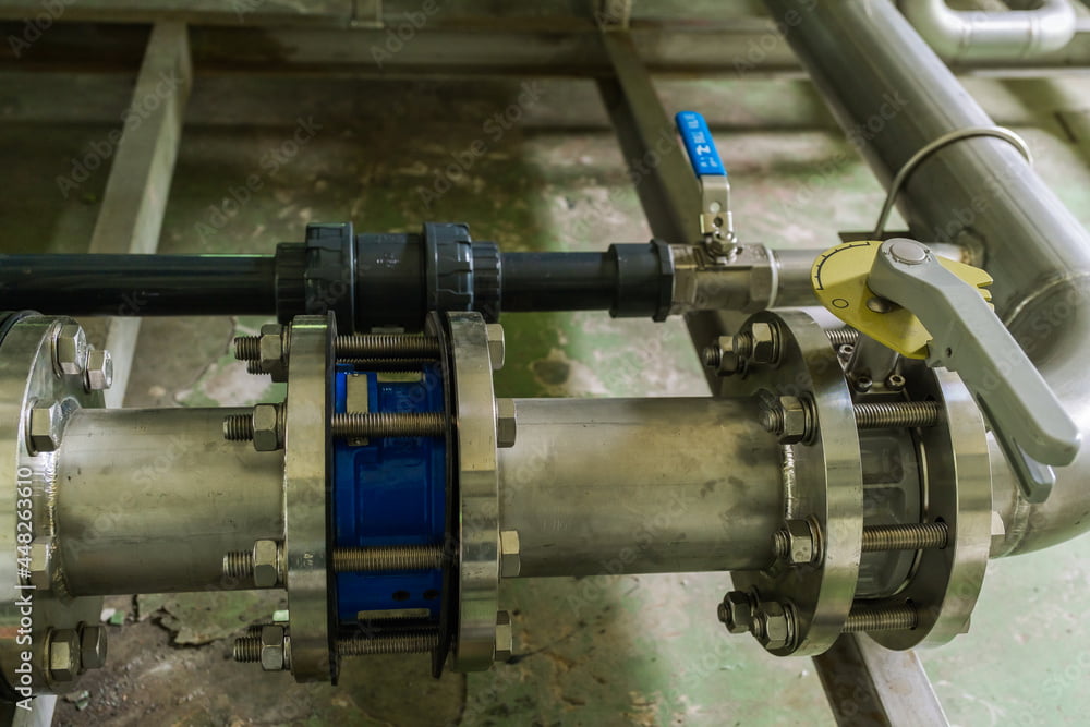 Check valve in the pump outlet pipe,valve prevent backflow of water.selective focus.